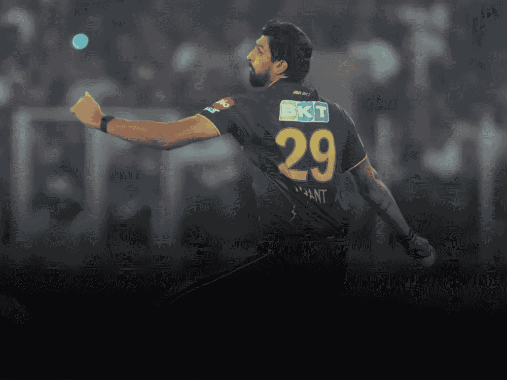 Ishant Sharma bowling in his GT jersey during IPL 2025, facing a tough match against SRH, with BCCI taking strict action after his performance