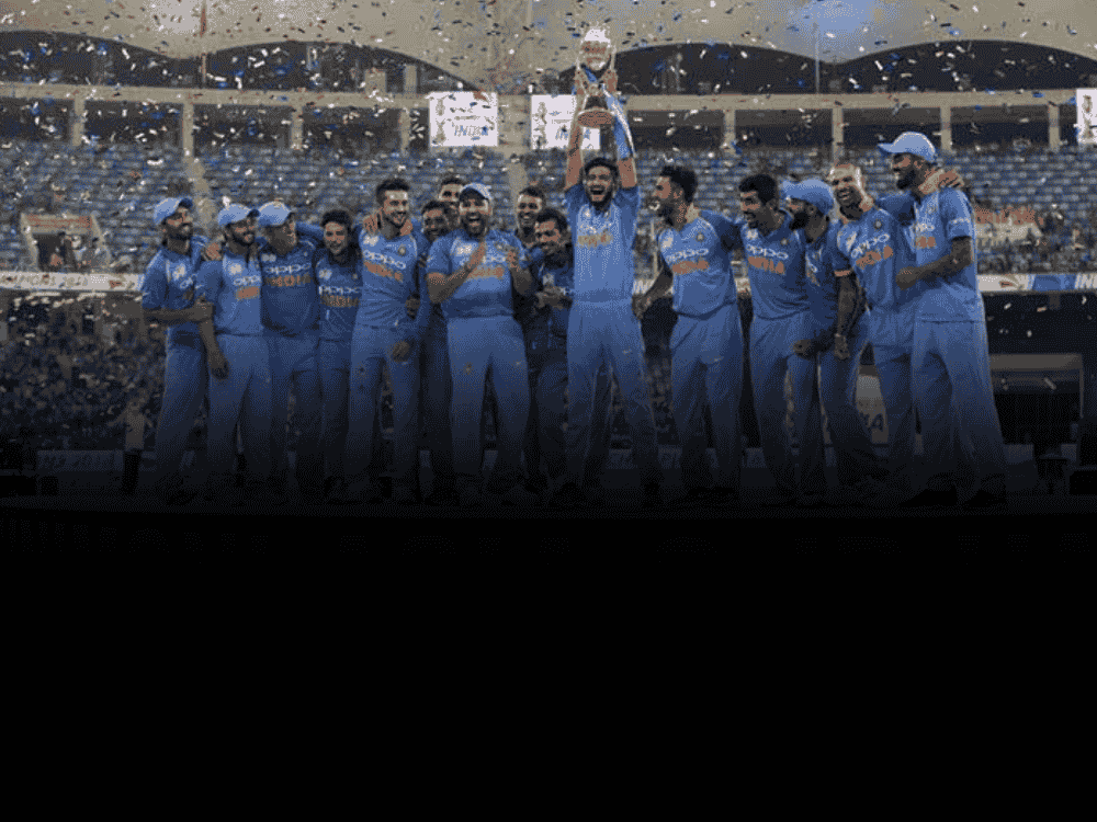 Indian team celebrating with the Asia Cup trophy, used for a blog about Asia Cup 2025 potential dates and hosting updates.